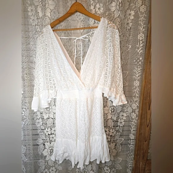 white flowy romper dress White Tiered Eyelet Lace Strapless Romper Dress main image 0